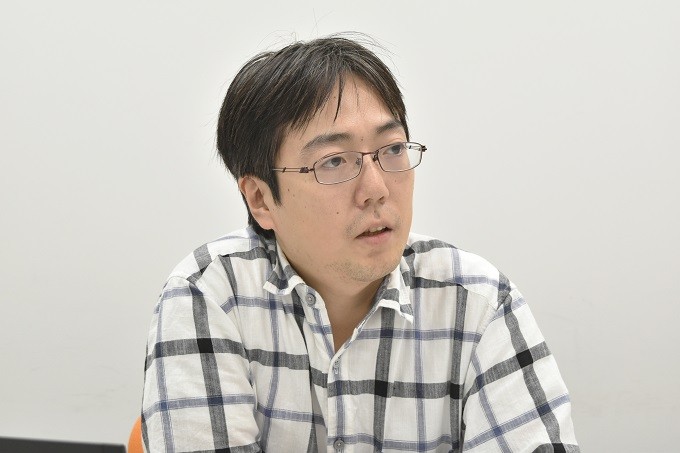 AI開発に興味を持ったきっかけについて語る井口氏の写真
