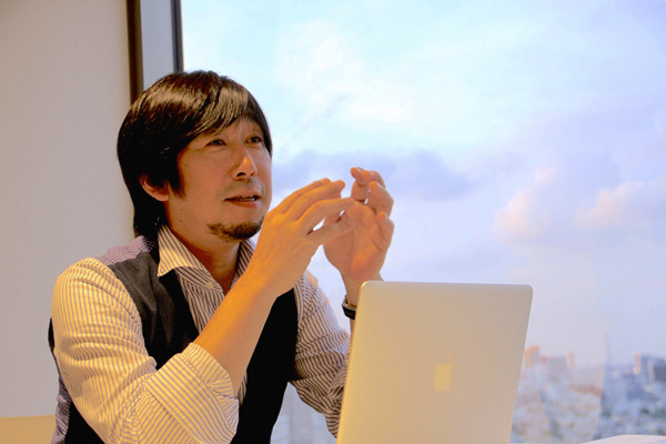 株式会社DMM.com ラボ　取締役 兼 CTO　城倉和孝氏が自身の就職前の時代について話をしている写真