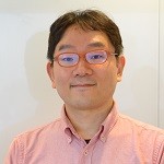 DMM.com Labo、ゲーム事業開発本部、ゲームシステム部部長河村明男氏の写真